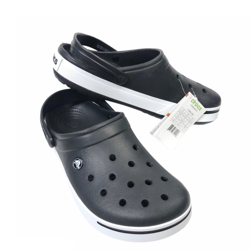 CROCS Black and White Sandals (women’s 7 or men’s 5)